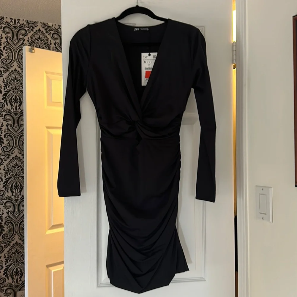 Zara black dress long sleeve with a triangle opening on the front at waist. - Picture 1 of 7